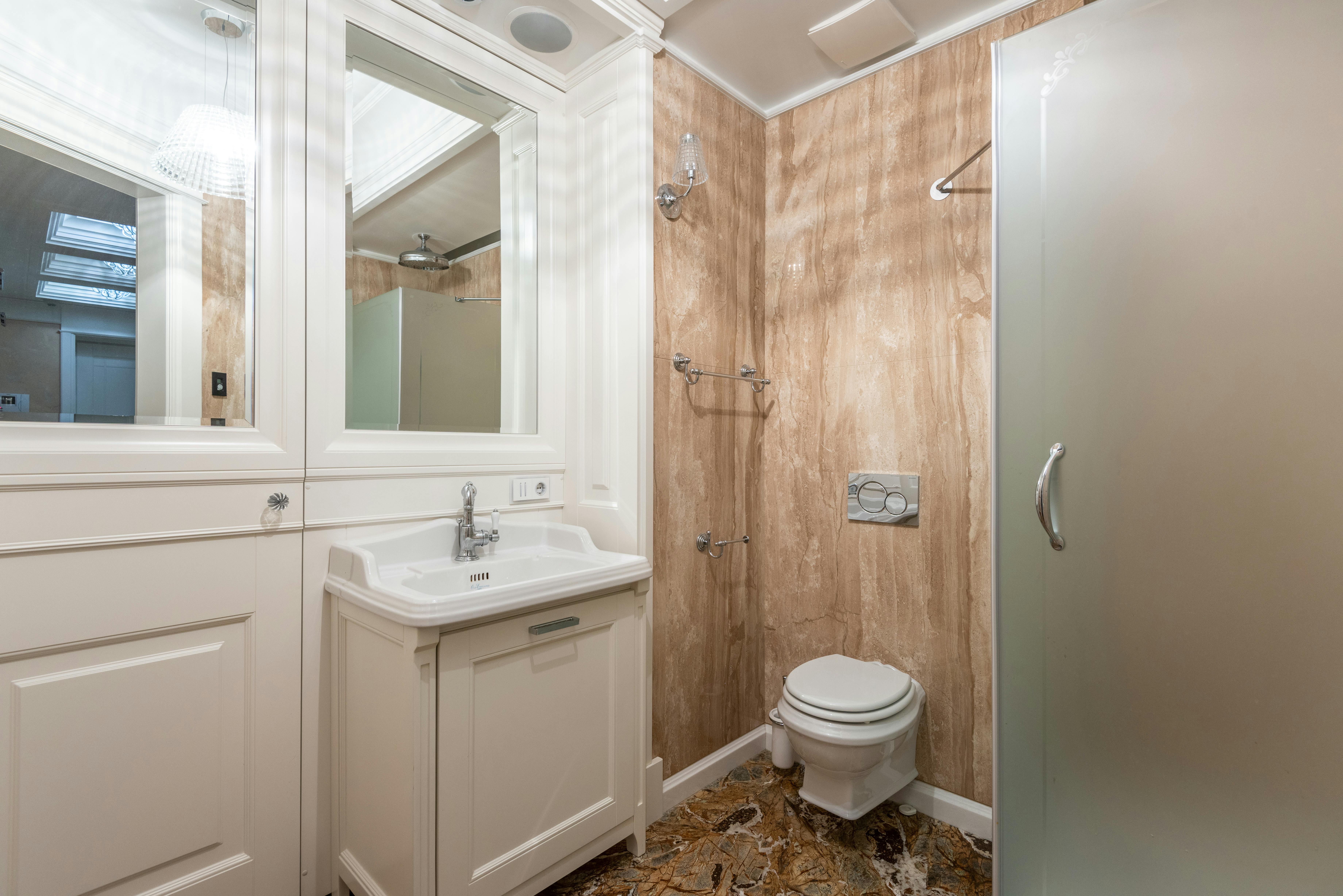 Bright bathroom with mirrors and soft lighting