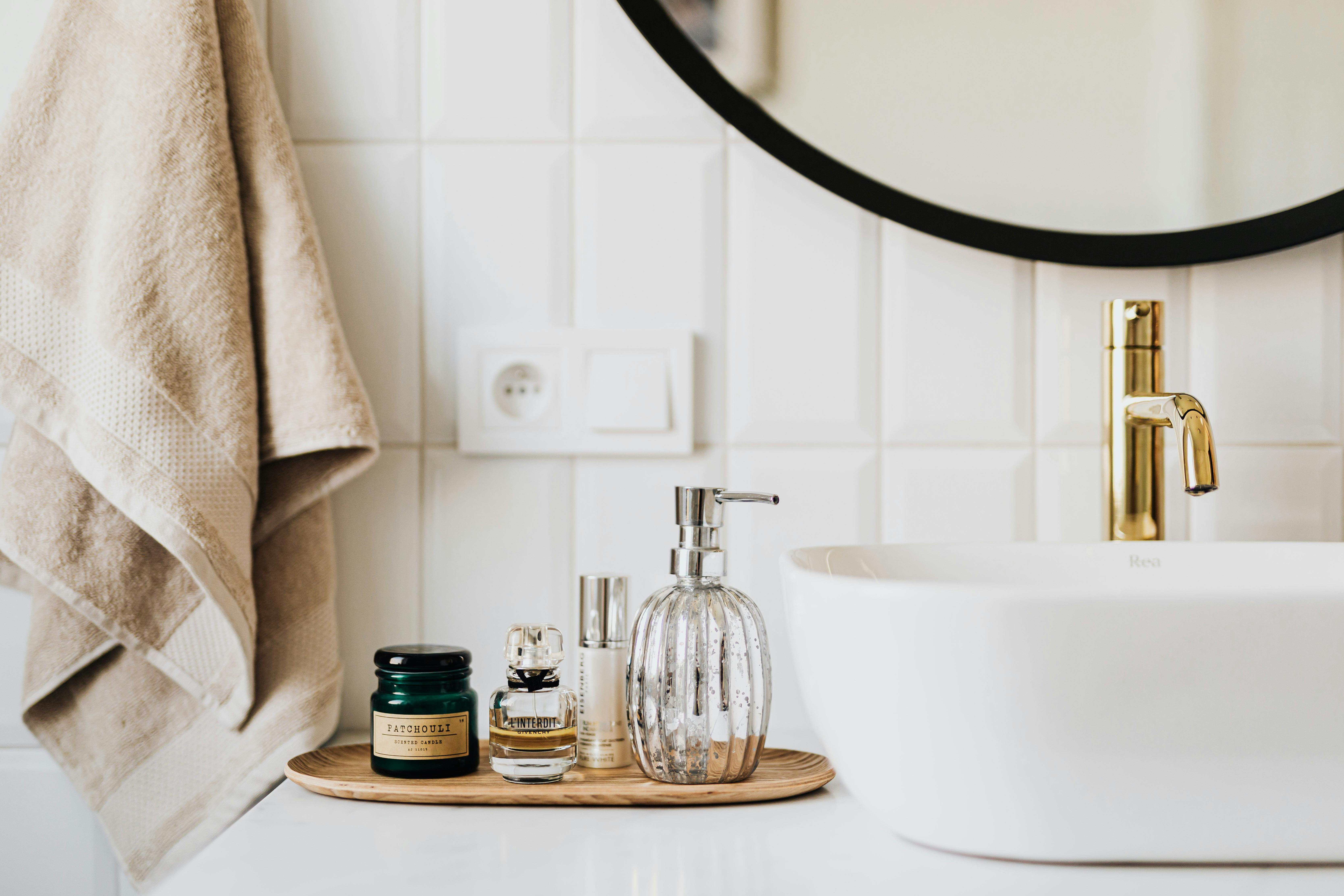 Floating shelves with neatly arranged bathroom essentials